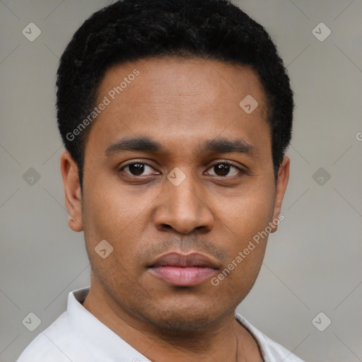 Neutral latino young-adult male with short  black hair and brown eyes