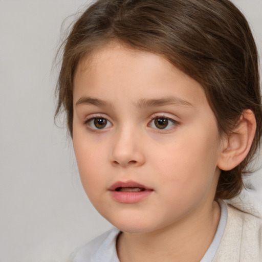 Neutral white child female with medium  brown hair and brown eyes