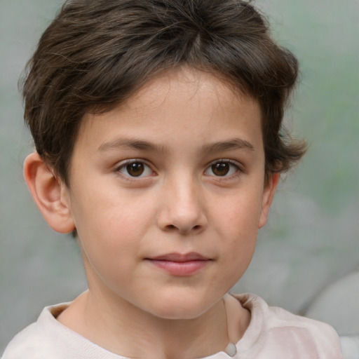 Joyful white child male with short  brown hair and brown eyes