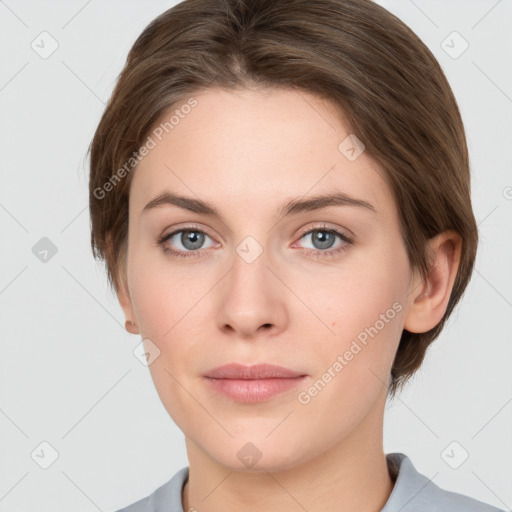 Neutral white young-adult female with medium  brown hair and grey eyes