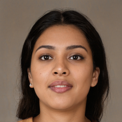 Neutral asian young-adult female with medium  brown hair and brown eyes