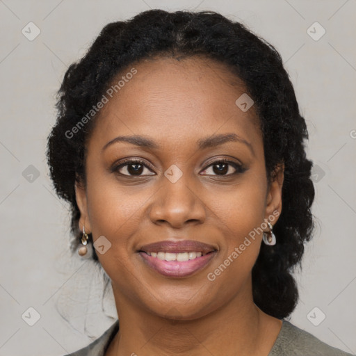 Joyful black young-adult female with medium  brown hair and brown eyes