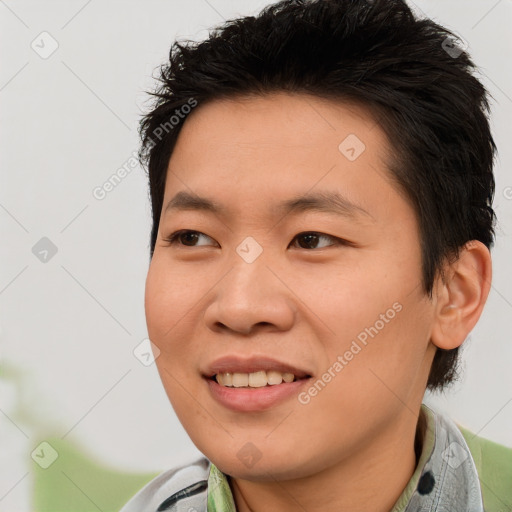 Joyful asian young-adult male with short  brown hair and brown eyes