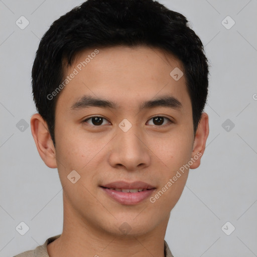 Joyful asian young-adult male with short  brown hair and brown eyes