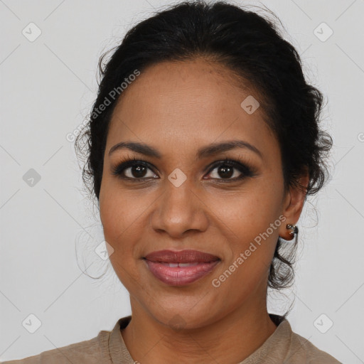 Joyful black young-adult female with medium  brown hair and brown eyes