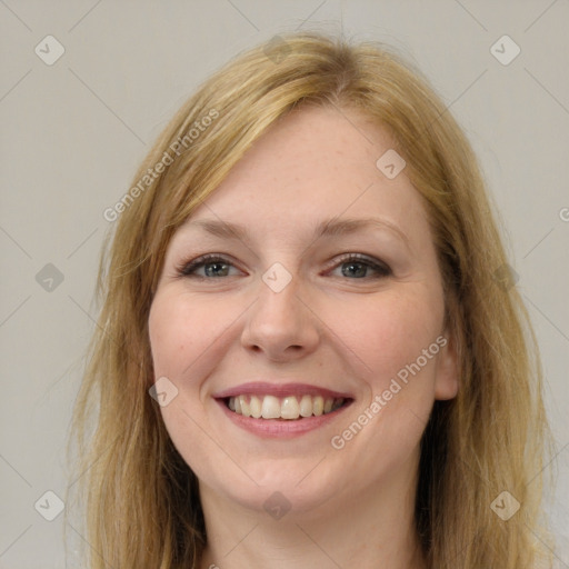 Joyful white young-adult female with long  brown hair and brown eyes