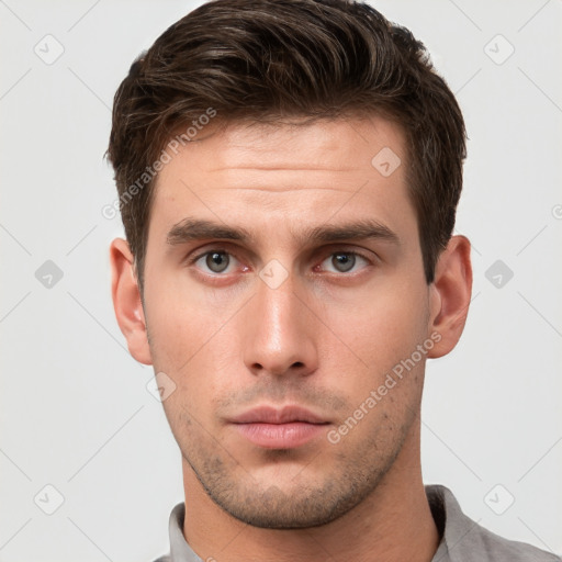 Neutral white young-adult male with short  brown hair and brown eyes