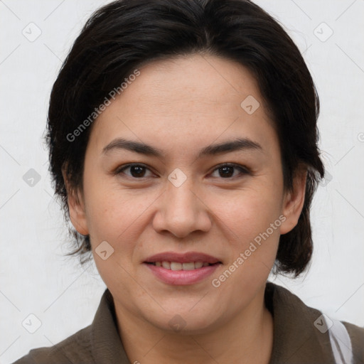 Joyful white adult female with medium  brown hair and brown eyes