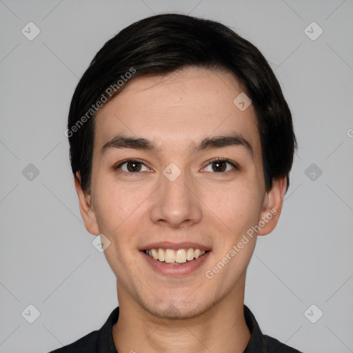 Joyful white young-adult male with short  black hair and brown eyes