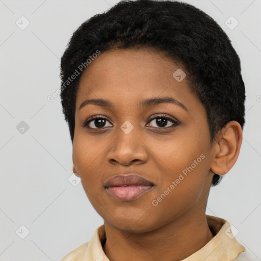 Joyful black young-adult female with short  black hair and brown eyes