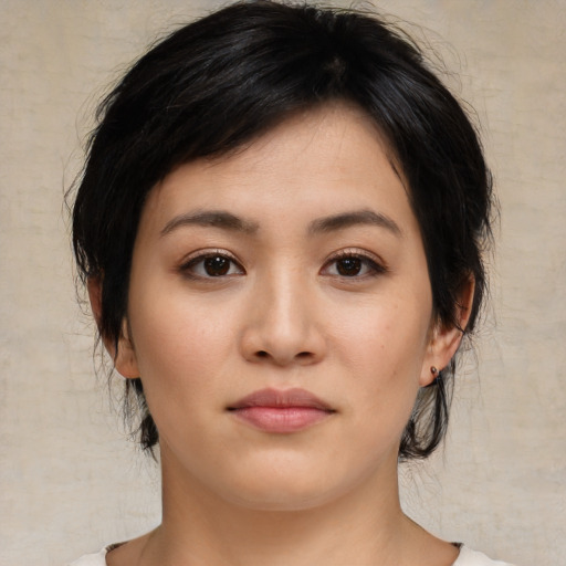 Neutral white young-adult female with medium  black hair and brown eyes