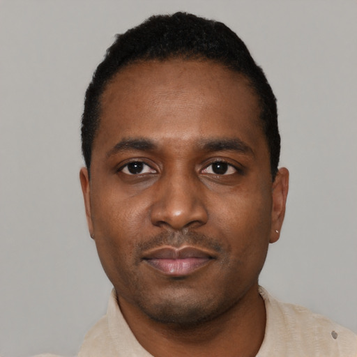 Neutral black young-adult male with short  black hair and brown eyes