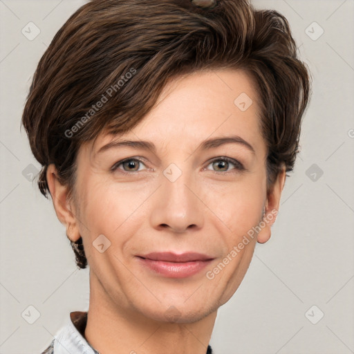 Joyful white adult female with short  brown hair and grey eyes