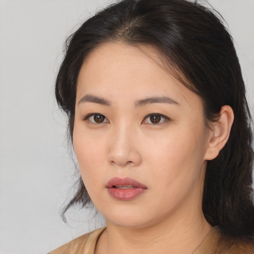 Neutral asian young-adult female with medium  brown hair and brown eyes