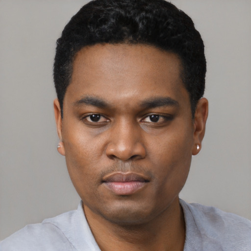 Neutral black young-adult male with short  black hair and brown eyes