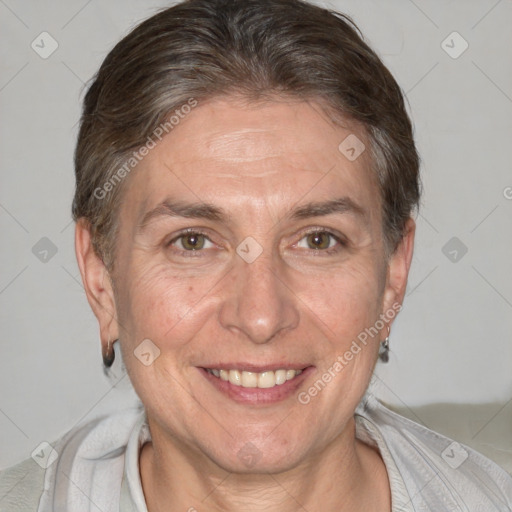 Joyful white adult female with short  brown hair and brown eyes