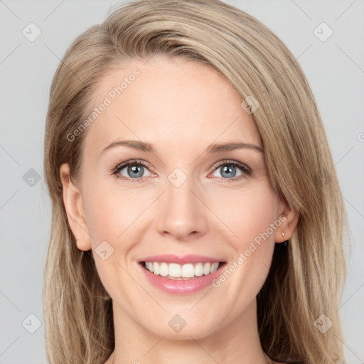 Joyful white young-adult female with long  brown hair and green eyes