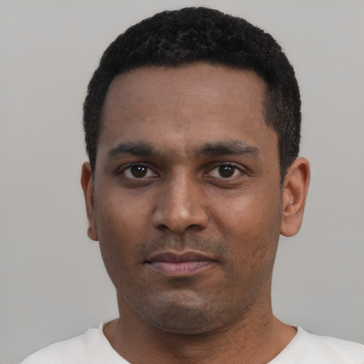 Neutral black young-adult male with short  black hair and brown eyes