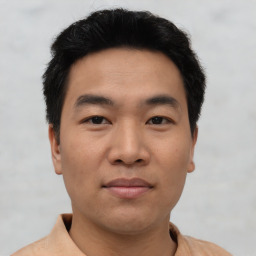 Neutral asian young-adult male with short  black hair and brown eyes