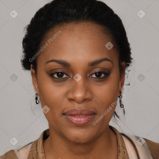 Joyful black young-adult female with long  black hair and brown eyes