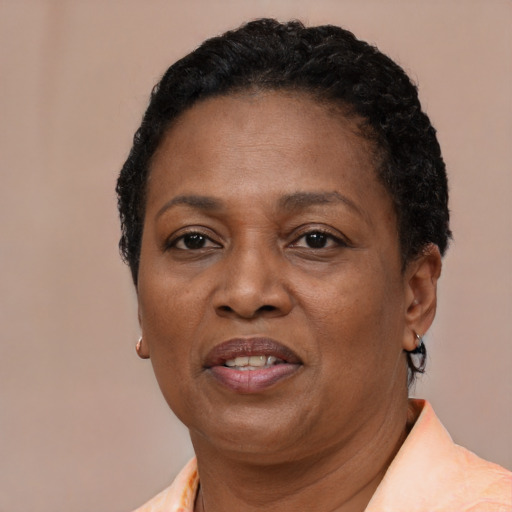 Joyful latino adult female with short  brown hair and brown eyes