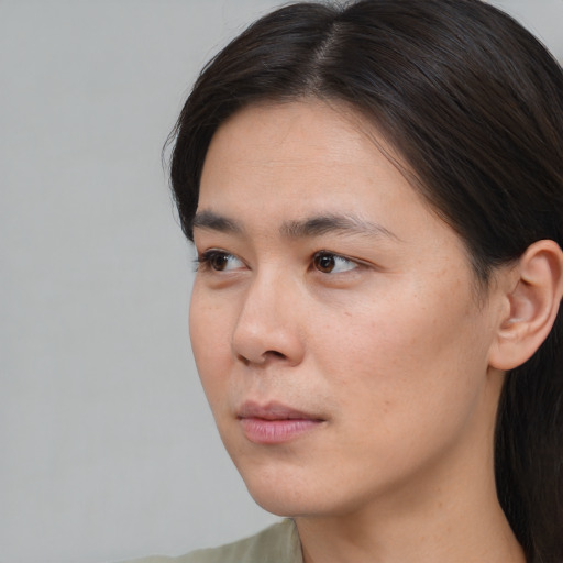 Neutral asian young-adult female with short  black hair and brown eyes
