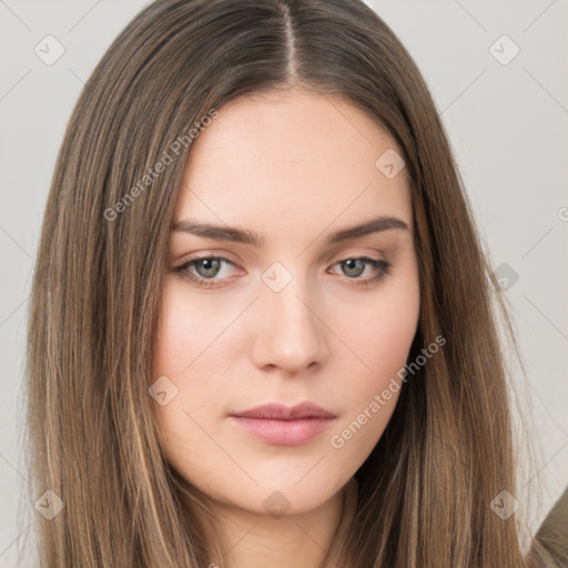 Neutral white young-adult female with long  brown hair and brown eyes