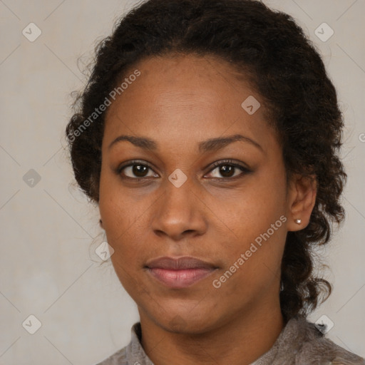 Neutral black young-adult female with medium  brown hair and brown eyes