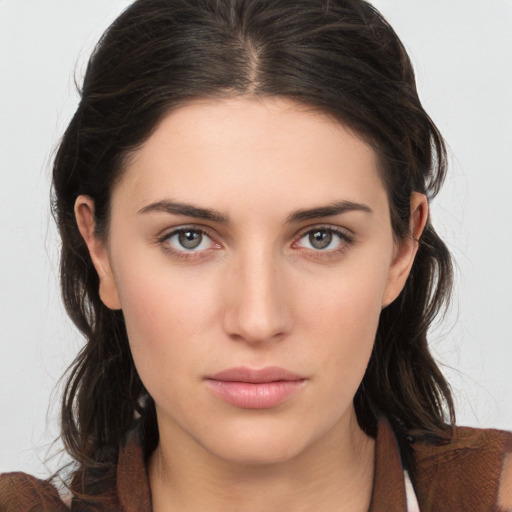 Neutral white young-adult female with medium  brown hair and brown eyes