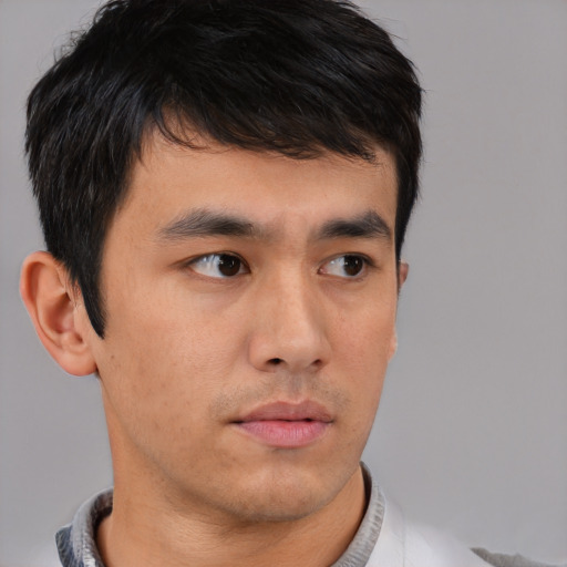 Neutral asian young-adult male with short  brown hair and brown eyes