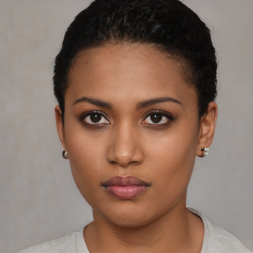 Neutral black young-adult female with short  black hair and brown eyes