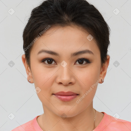 Joyful asian young-adult female with short  brown hair and brown eyes