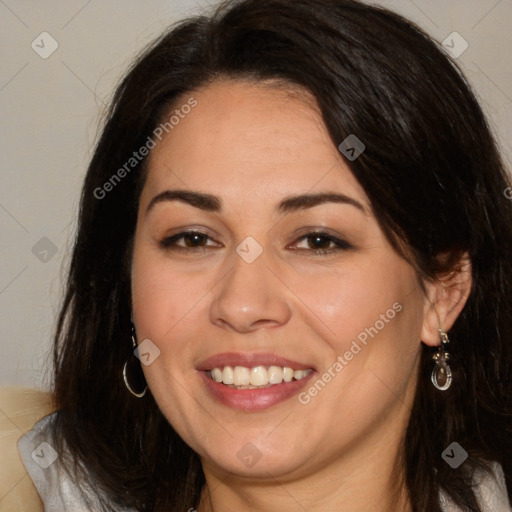 Joyful white adult female with long  brown hair and brown eyes