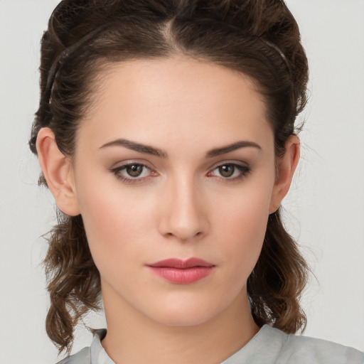 Neutral white young-adult female with medium  brown hair and brown eyes