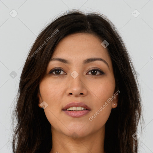 Joyful asian young-adult female with long  brown hair and brown eyes