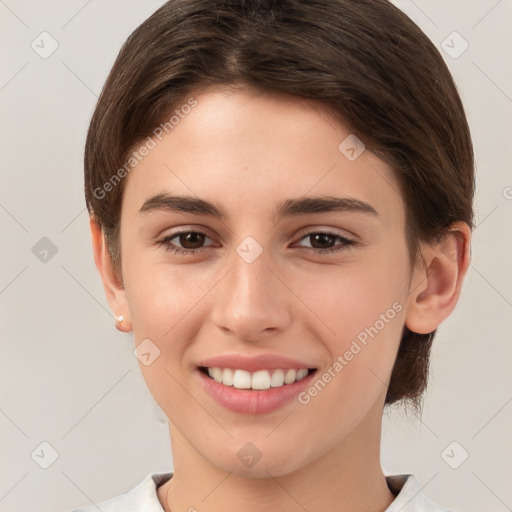 Joyful white young-adult female with short  brown hair and brown eyes