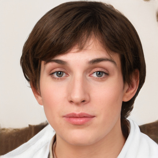 Neutral white young-adult female with medium  brown hair and grey eyes