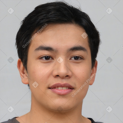 Joyful asian young-adult male with short  brown hair and brown eyes