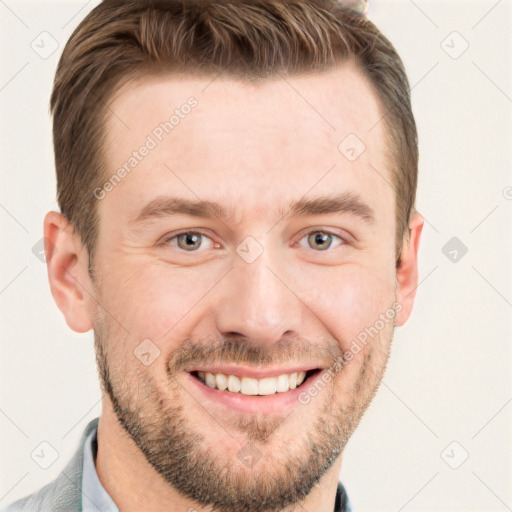 Joyful white adult male with short  brown hair and brown eyes