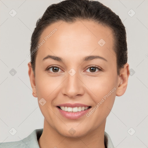 Joyful white young-adult female with short  brown hair and brown eyes