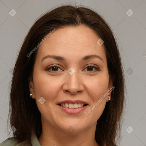 Joyful white adult female with medium  brown hair and brown eyes