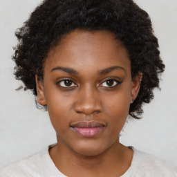 Neutral black young-adult female with short  brown hair and brown eyes