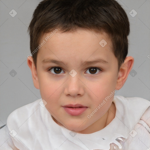 Joyful white child male with short  brown hair and brown eyes