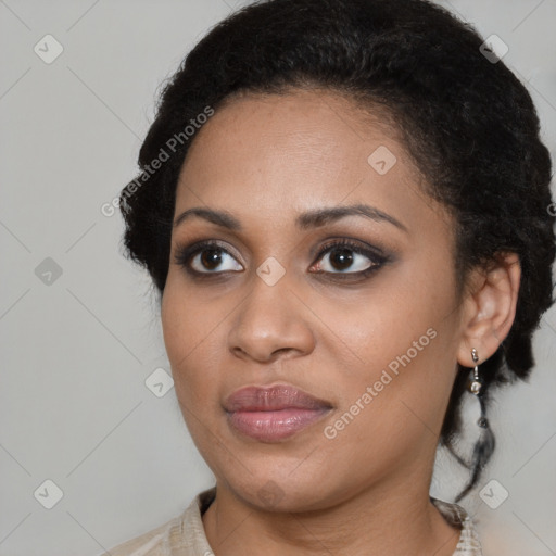 Joyful black young-adult female with medium  black hair and brown eyes