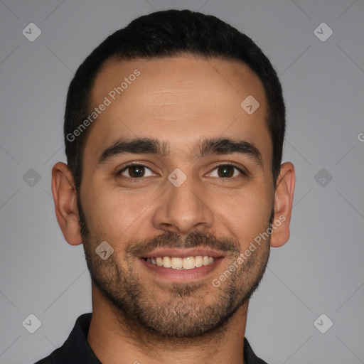 Joyful white young-adult male with short  black hair and brown eyes