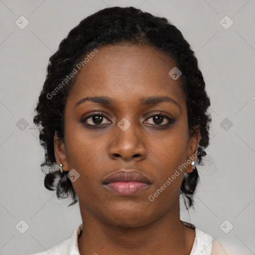 Neutral black young-adult female with medium  black hair and brown eyes