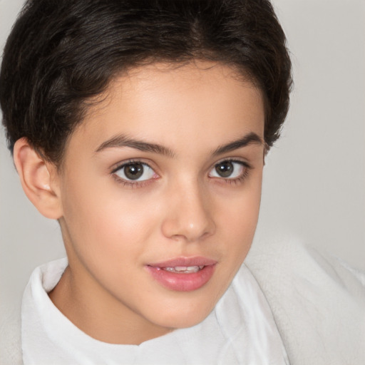 Joyful white child female with short  brown hair and brown eyes