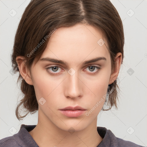 Neutral white young-adult female with medium  brown hair and grey eyes