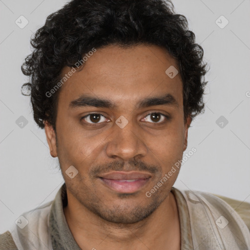 Joyful black young-adult male with short  brown hair and brown eyes