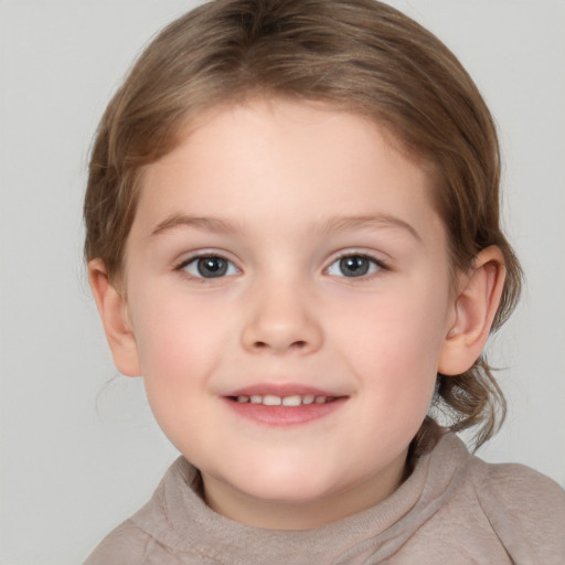 Joyful white child female with medium  brown hair and grey eyes